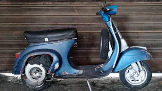 Vespa V5A2T  2ª serie 3 marce faro quadrato ruote 9" epoca