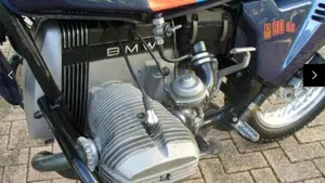 Bm   (3)