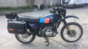 Bm   (6)