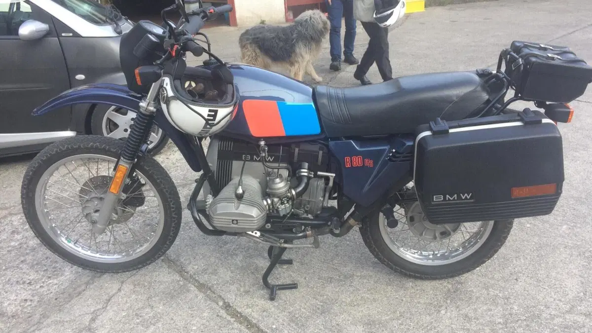 Bm   (7)
