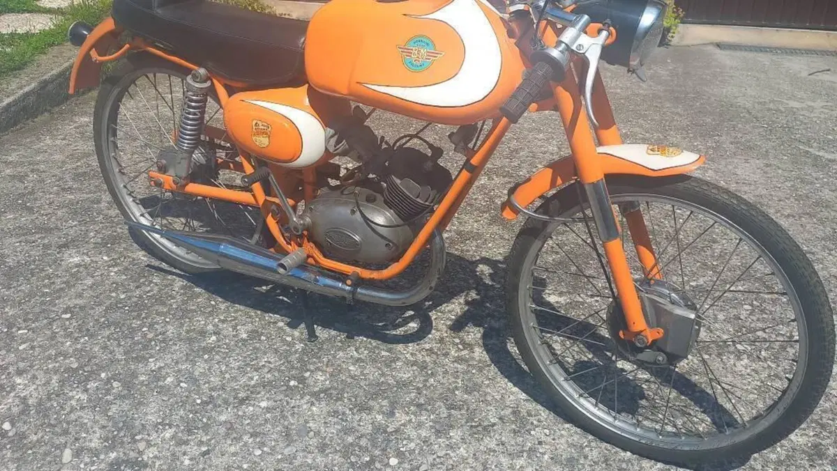 Bm   (7)